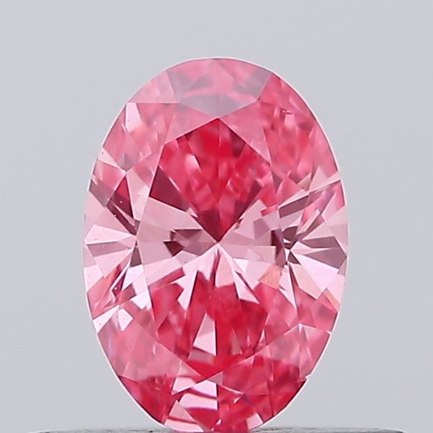 Actual 0.28 carat Fancy Vivid Pink Oval lab-grown diamond
