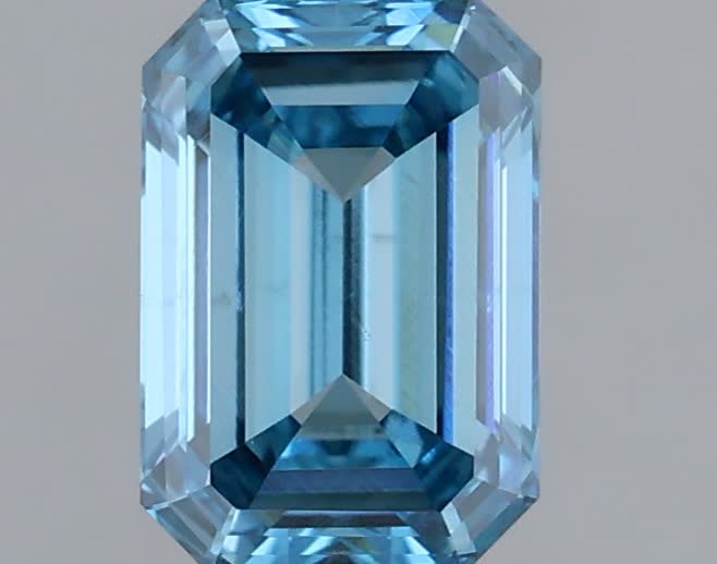 Actual 0.47 carat Fancy Vivid Blue Emerald lab-grown diamond