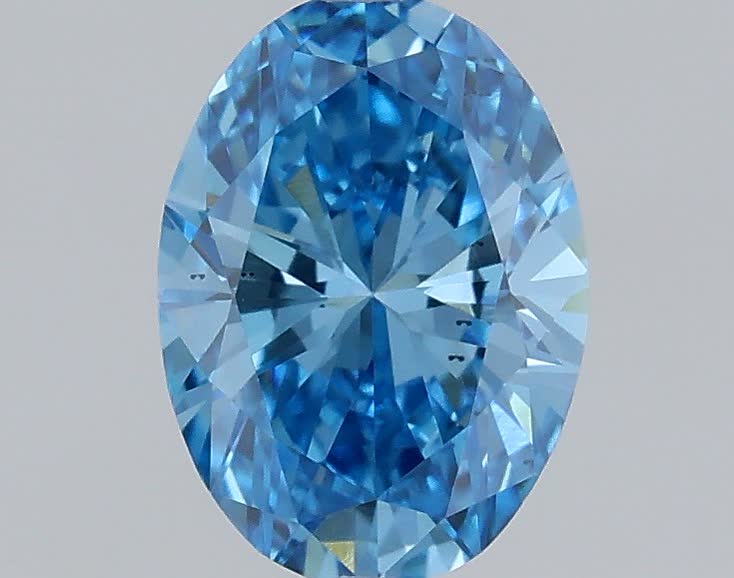 Actual 0.41 carat Fancy Vivid Blue Oval lab-grown diamond