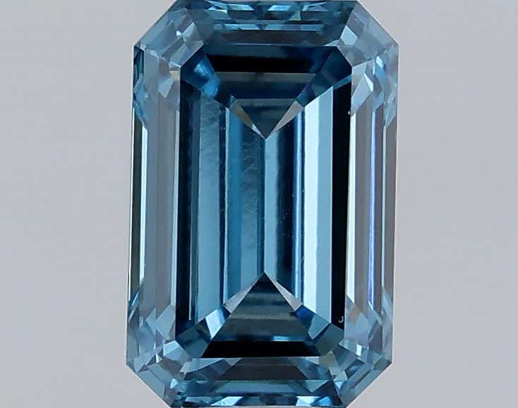 Actual 0.53 carat Fancy Vivid Blue Emerald lab-grown diamond