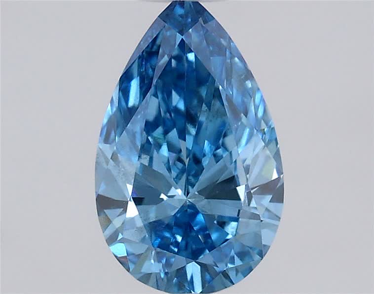 Actual 0.59 carat Fancy Vivid Blue Pear lab-grown diamond