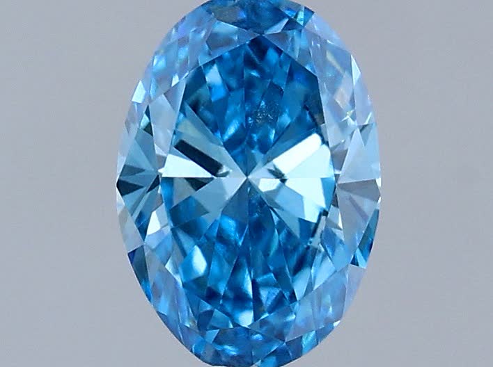 Actual 0.28 carat Fancy Vivid Blue Oval lab-grown diamond