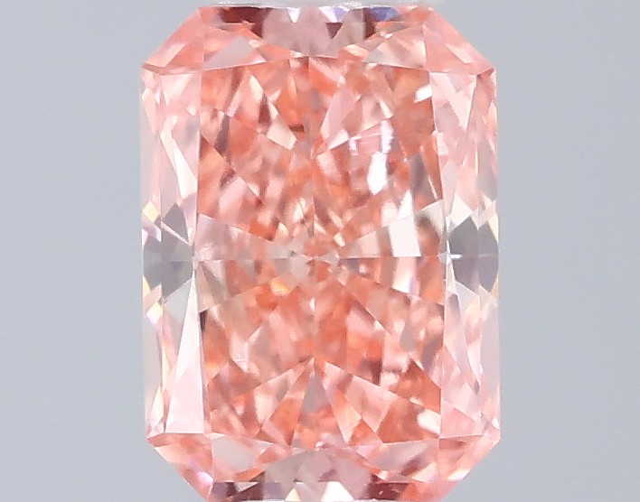 Actual 0.32 carat Fancy Vivid Pink Radiant lab-grown diamond
