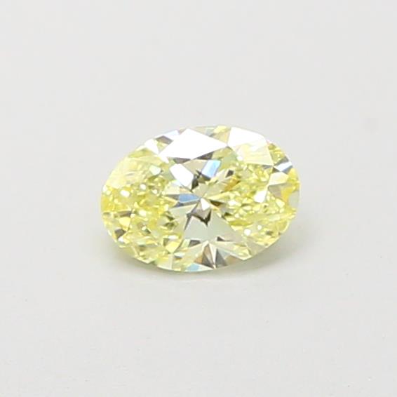 Actual 0.29 carat Fancy Yellow Oval lab-grown diamond
