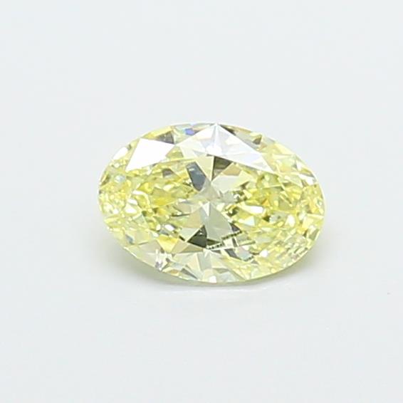 Actual 0.39 carat Fancy Yellow Oval lab-grown diamond