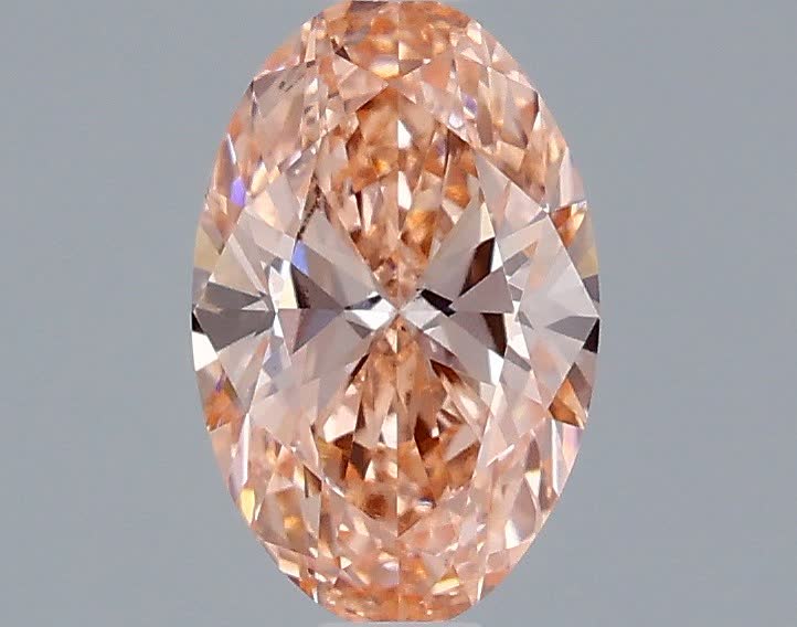 1.02 carat fancy vivid  pink VS2 EX Cut IGI oval diamond