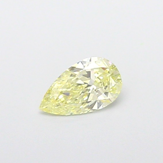 Actual 0.33 carat Fancy Yellow Pear lab-grown diamond