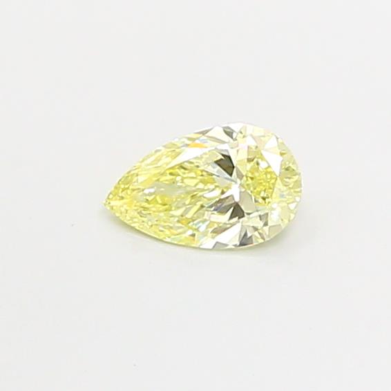 Actual 0.38 carat Fancy Yellow Pear lab-grown diamond