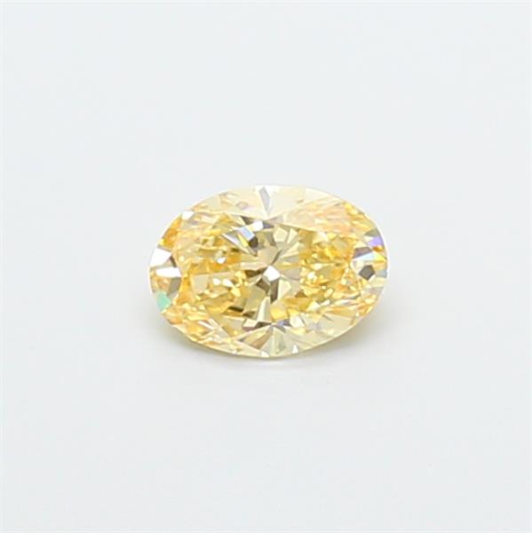 Actual 0.38 carat Fancy Yellow Oval lab-grown diamond
