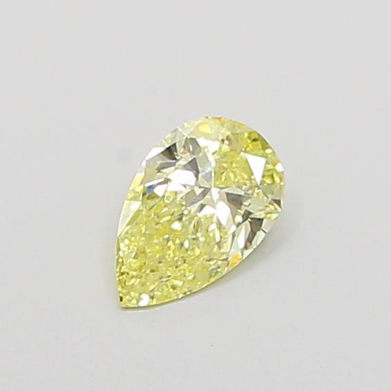 Actual 0.33 carat Fancy Yellow Pear lab-grown diamond