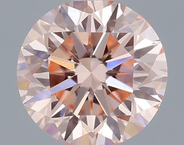 Actual 0.43 carat Fancy Intense Pink Round lab-grown diamond