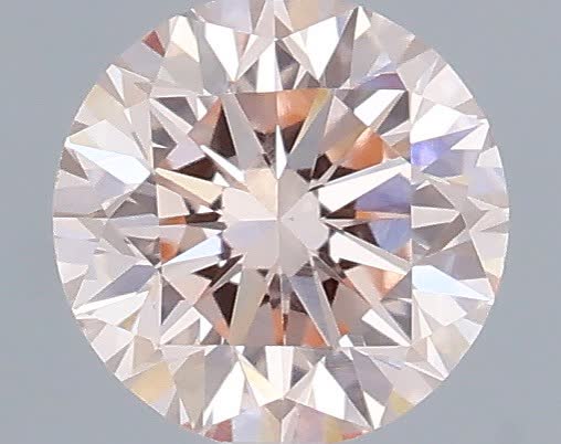 Actual 0.36 carat Fancy Intense Pink Round lab-grown diamond