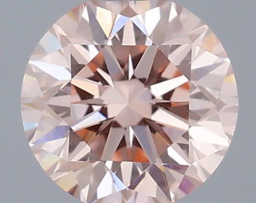 Actual 0.36 carat Fancy Intense Pink Round lab-grown diamond