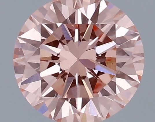 Actual 0.31 carat Fancy Vivid Pink Round lab-grown diamond