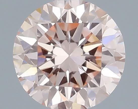 Actual 0.32 carat Fancy Intense Pink Round lab-grown diamond