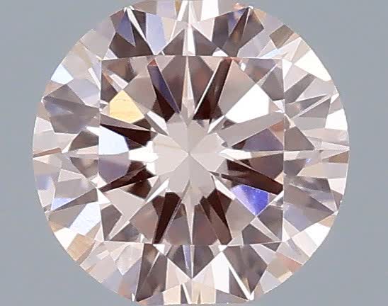 Actual 0.35 carat Fancy Intense Pink Round lab-grown diamond