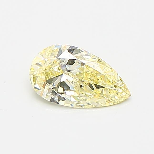 Actual 0.33 carat Fancy Yellow Pear lab-grown diamond