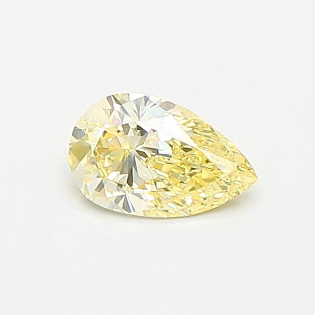 Actual 0.32 carat Fancy Yellow Pear lab-grown diamond