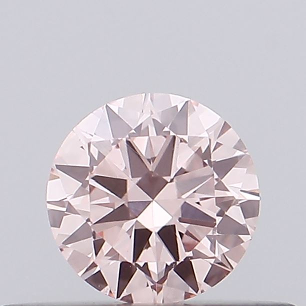 Actual 0.29 carat Fancy Intense Pink Round lab-grown diamond