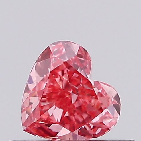 Actual 0.3 carat Fancy Vivid Pink Heart lab-grown diamond